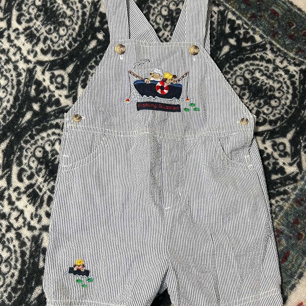 Vitamins Baby blue and white striped seersucker romper with a "Fishing Buddies"